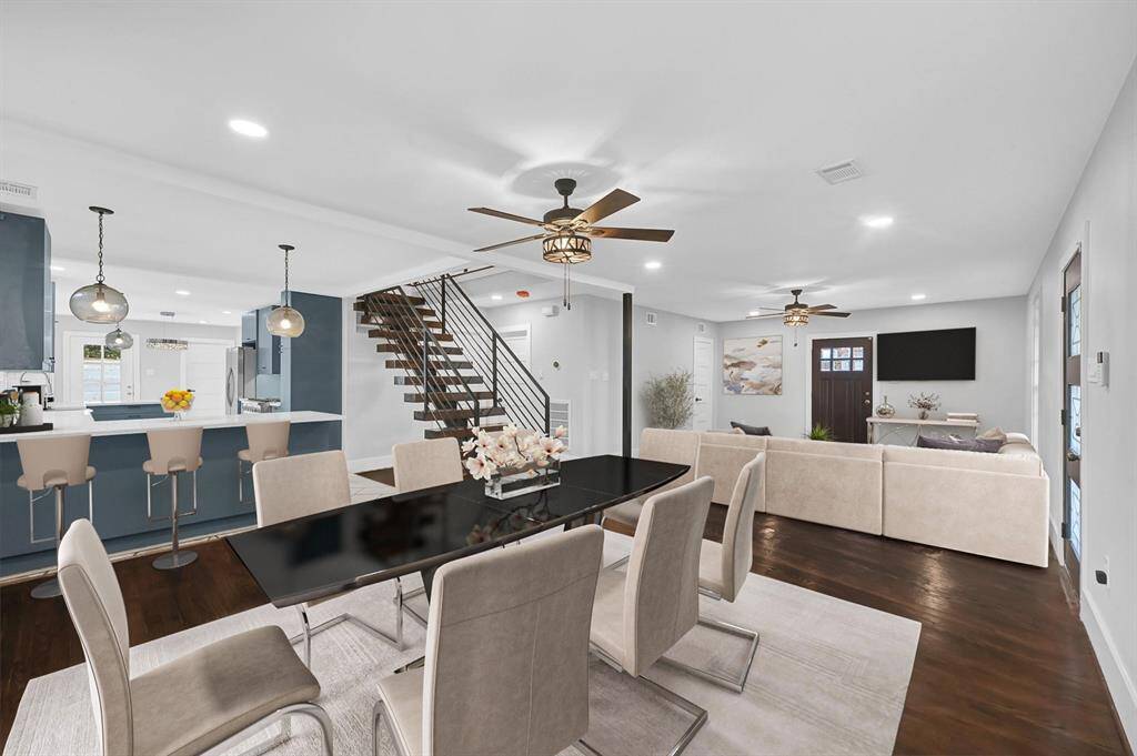 Enjoy the seamless flow of this open floorplan, showcasing the inviting living room, elegant dining area, and stylish kitchen peninsula—perfect for both everyday living and entertaining guests. *Virtually Staged*