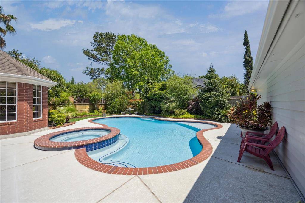 With space to accommodate up to five vehicles, this oversized garage offers incredible flexibility. Complete with built-in storage and access to the pool bath, it also presents a rare opportunity for conversion into a pool house, guest quarters, or a private MIL suite, imagine the possibilities!