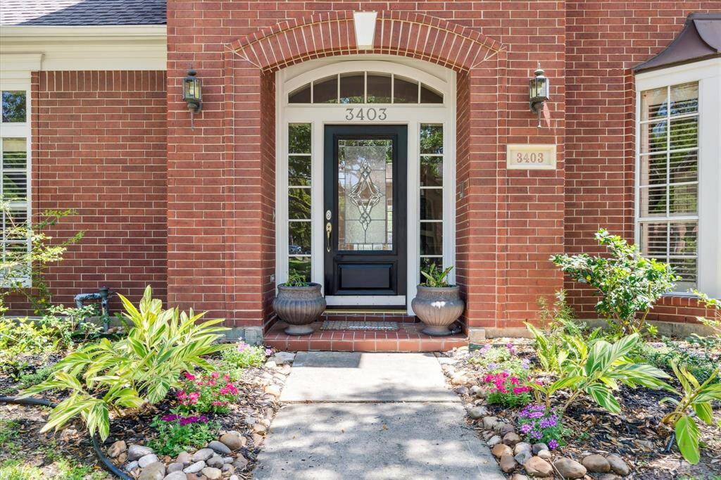 This rare oversized 5-car garage offers exceptional space and versatility, featuring a full pool bath, dedicated workshop area, and outstanding potential for conversion into a private MIL suite, pool house, or custom flex space.
