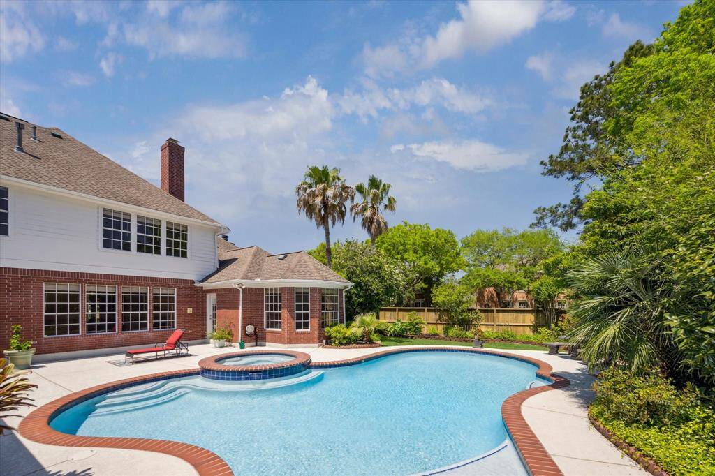 This backyard paradise is ready for summer fun with a sparkling pool and attached spa, both replastered in 2025 along with a freshly coated Cool Deck. Surrounded by lush landscaping and plenty of patio space, it’s the perfect place to relax or entertain. With direct access to the convenient pool bath, enjoying the outdoors has never been easier.