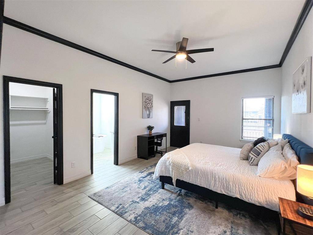 Primary bedroom with access to backyard