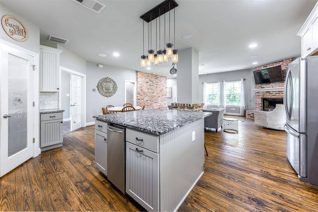 Built-in beverage refrigerator in the center island!