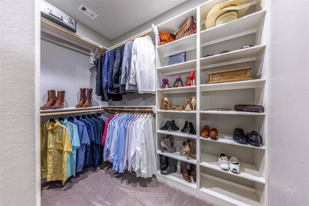 Custom primary closet.