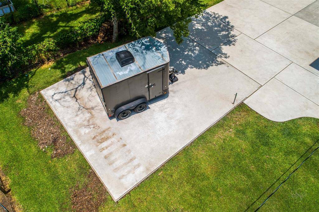 Pre-engineered slab ready for 24x32 metal building with 10’ roll up door and walk-in side door (recommend Bal-Con metal Buildings).