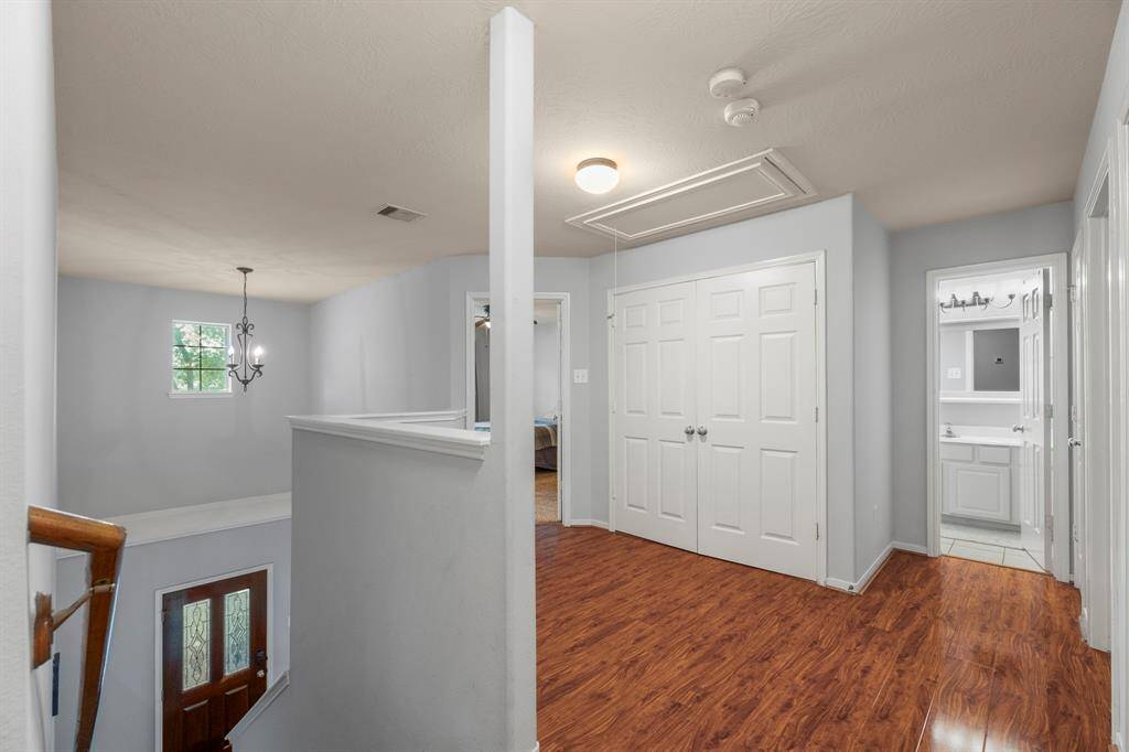 Head upstairs to find a spacious landing, access to the upstairs laundry room, and the rest of the bedrooms and bathrooms!