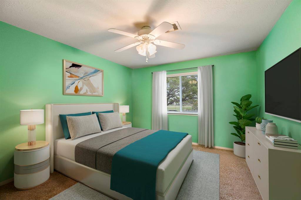 Bright and inviting, this spacious secondary bedroom offers plenty of room for relaxation and personalization, making it the perfect retreat for family or guests. *This room has been virtually staged