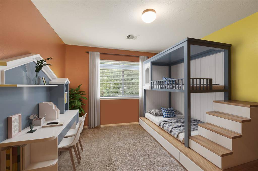 Another spacious secondary bedroom with bright natural light, custom accent paint, plush carpet and spacious closet. *This room has been virtually staged