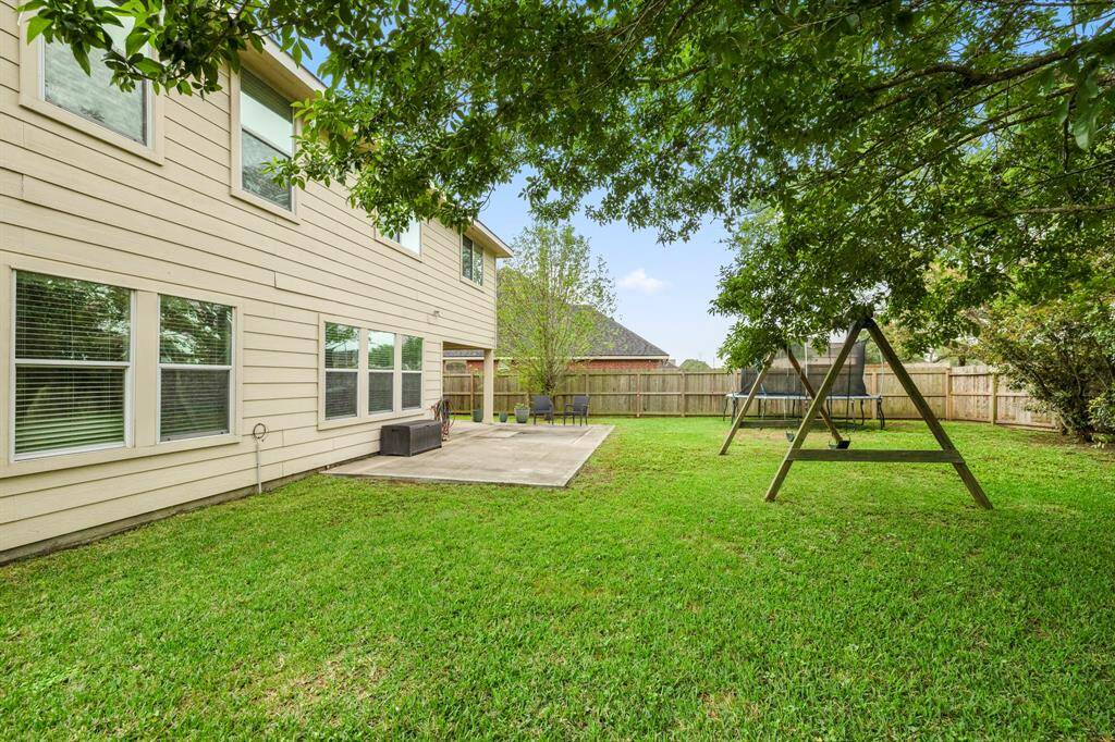 Enjoy the outdoors in this spacious and low-maintenance backyard! With plenty of room for play, gardening, or relaxing, this private outdoor space is the perfect blank canvas to make your own.