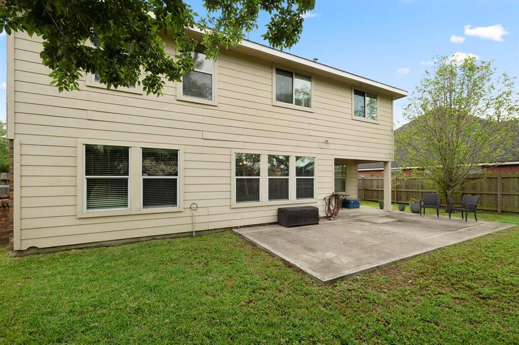 Sit back, relax and enjoy your backyard while sitting on the large patio! There's plenty of greenspace to enjoy!