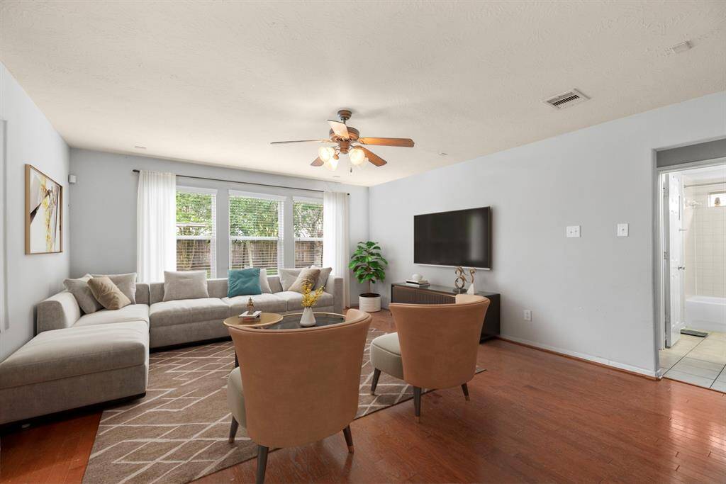 Whether it's a simple night in or entertaining family and friends, this home has ample open space for everyone to enjoy! This room can fit any size tv making it great for the next big game or movie night. *This room has been virtually staged