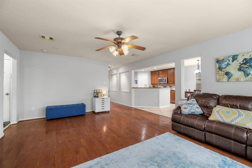 This thoughtfully designed open-concept layout offers a perfect blend of warmth and functionality. The open concept living room and kitchen makes for a great way to keep the party going and never miss a beat!