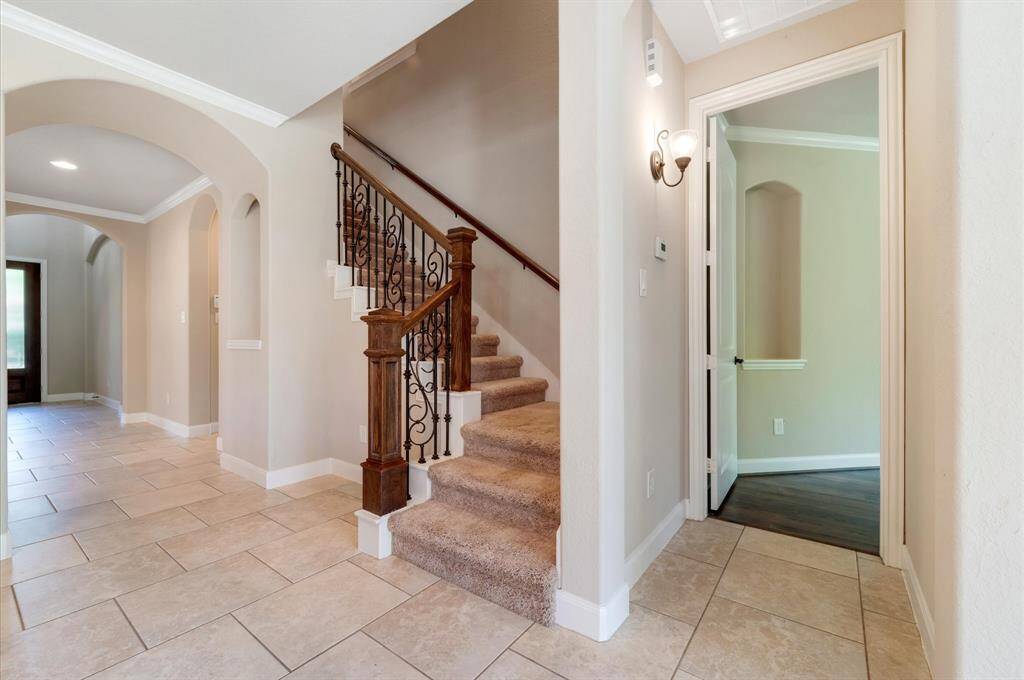 Wrought iron stairway rail.