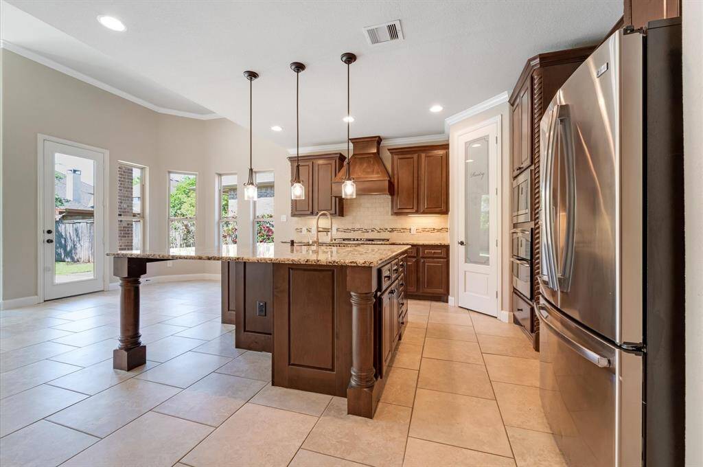 A view of the beautiful spacious kitchen.