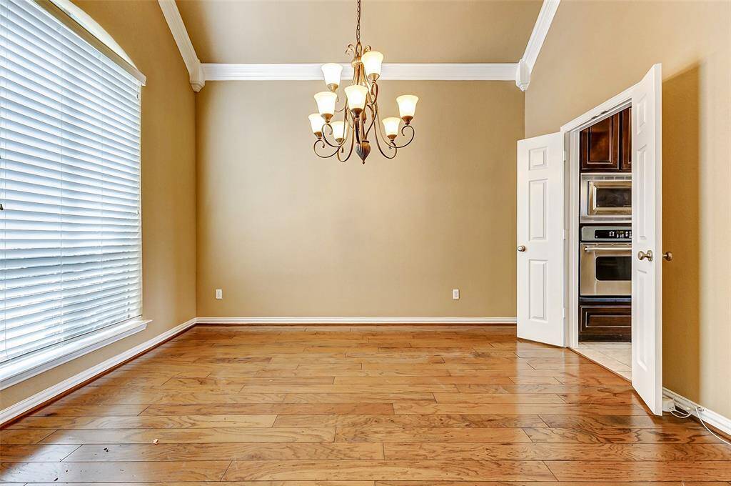Bright dining room with wood floors