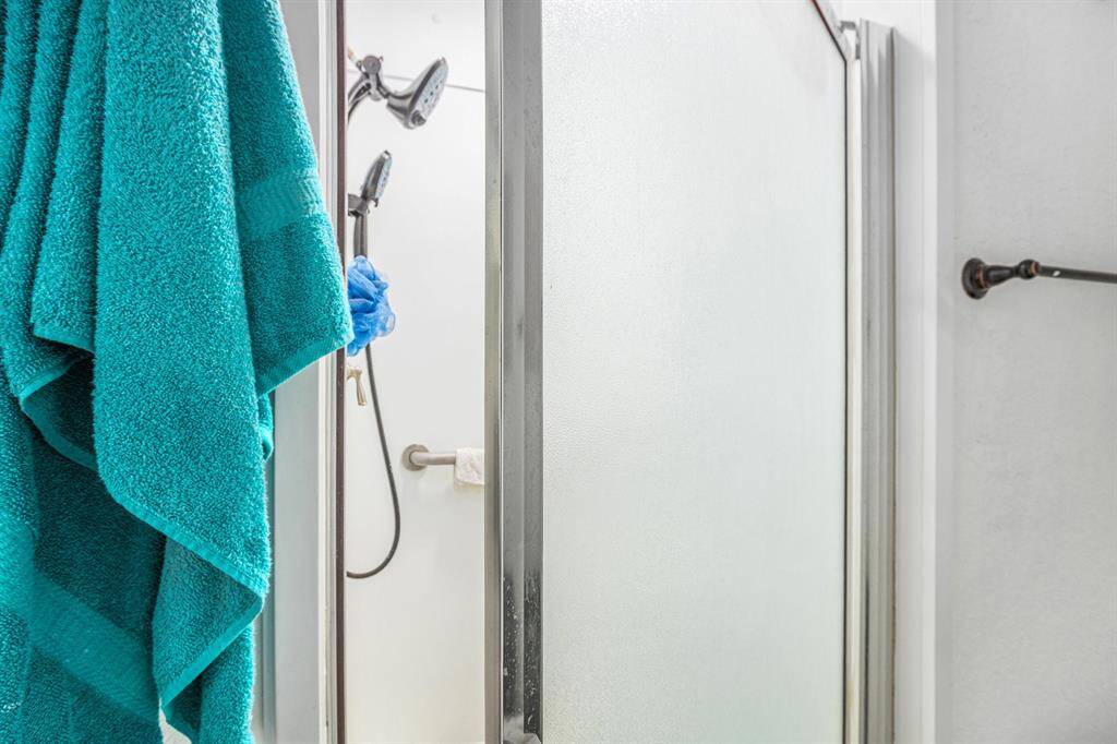 Walk-in shower for the primary bathroom.