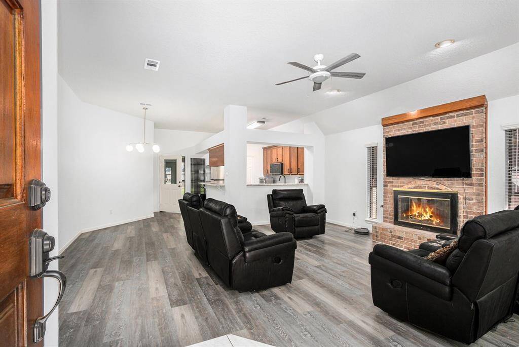Upon entry you are greeted with an open concept kitchen/living room combo.