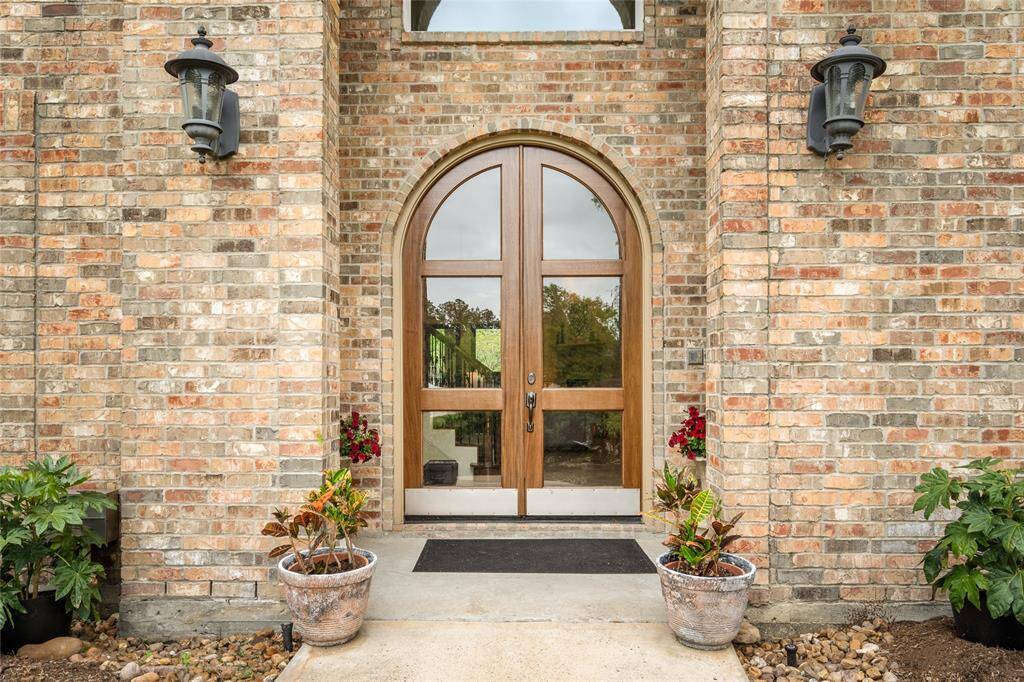 Enter through the grand front door, and step inside.