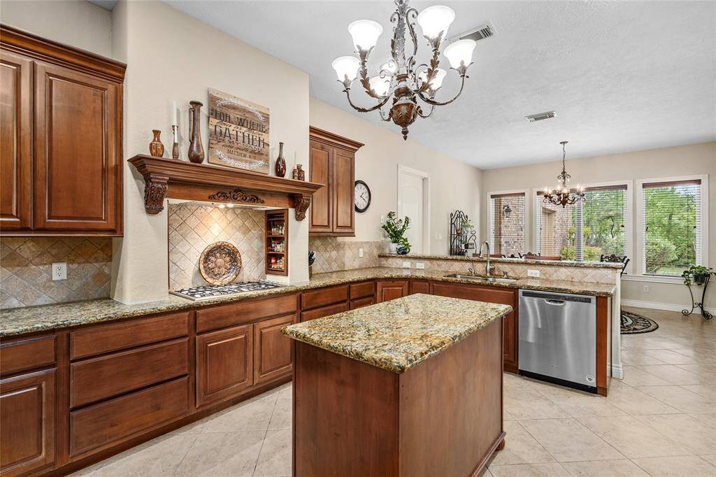 The kitchen island provides extra workspace and storage.