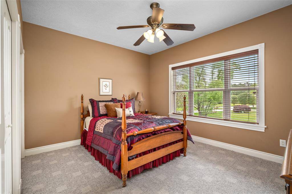 One of the secondary bedrooms, looking out to the front of the home.