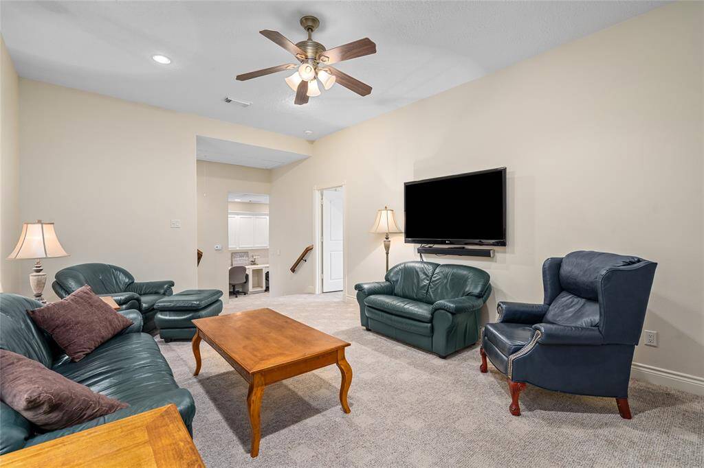 Connected to the gameroom is the last secondary bedroom.