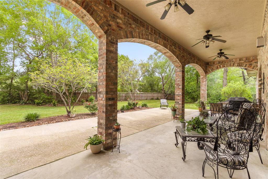 Complete with a covered patio and ceiling fans to keep you cool in the summer time.