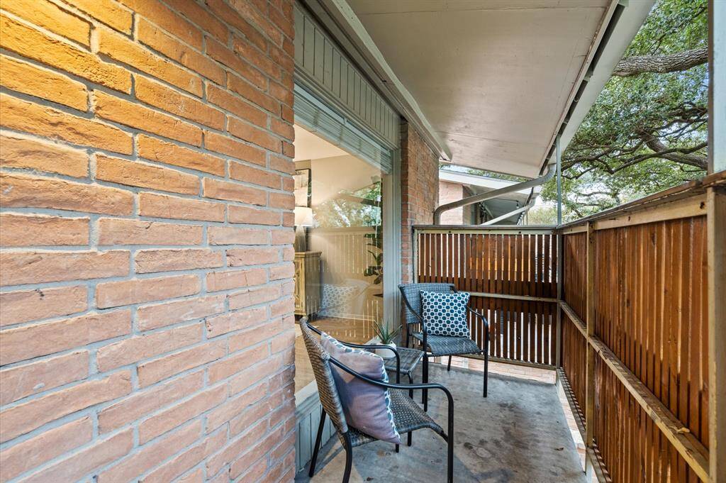 Your private balcony awaits. Enjoy a morning cup of coffee as you gaze at some 100 year-old trees that existed before the community was built!