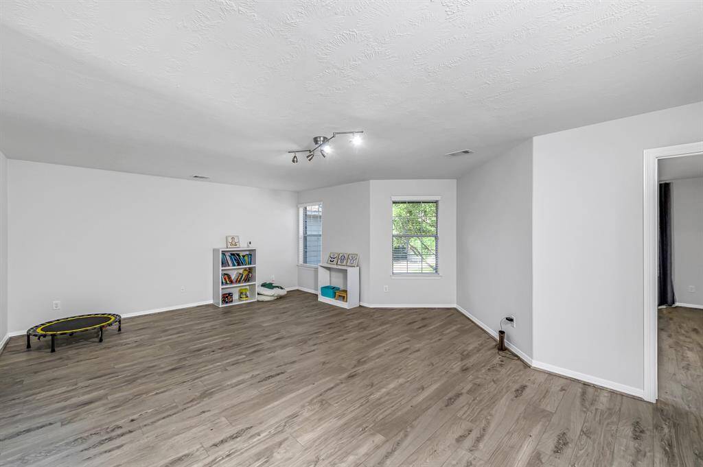Expansive upstairs gameroom