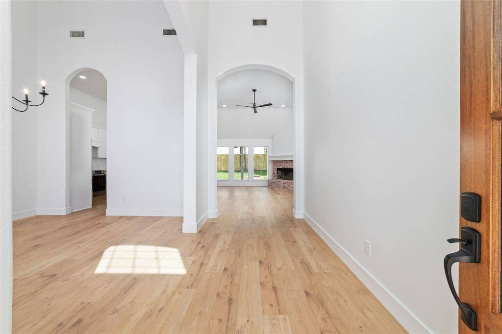 Brand new warm LVP floors greet you at the entry, setting a welcoming tone for the home.