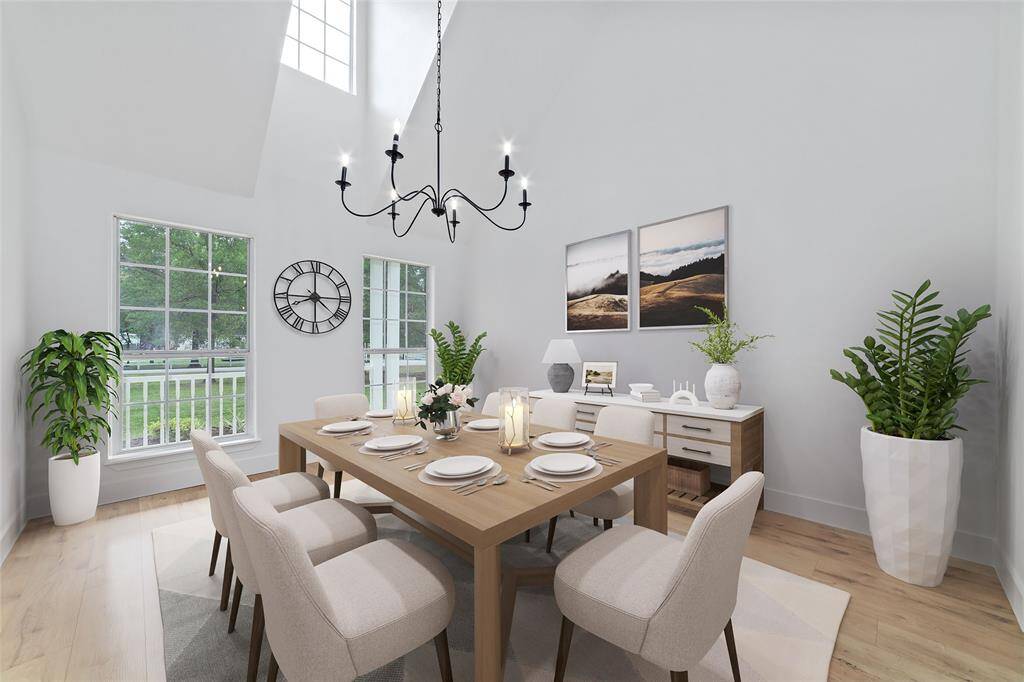 Gorgeous dining room with soaring ceilings and tons of natural light.  *virtually staged*