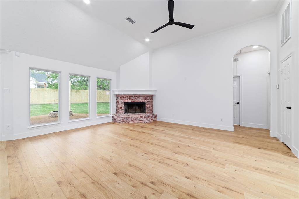 Enjoy serene backyard views from the spacious family room.