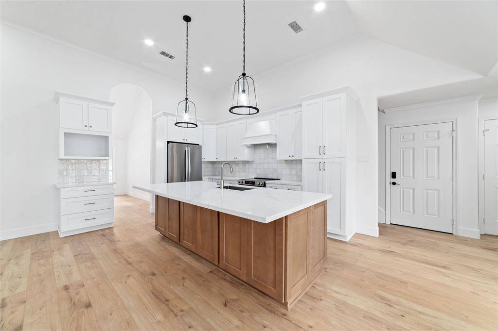 Ample counter space with convenient in-kitchen dining.