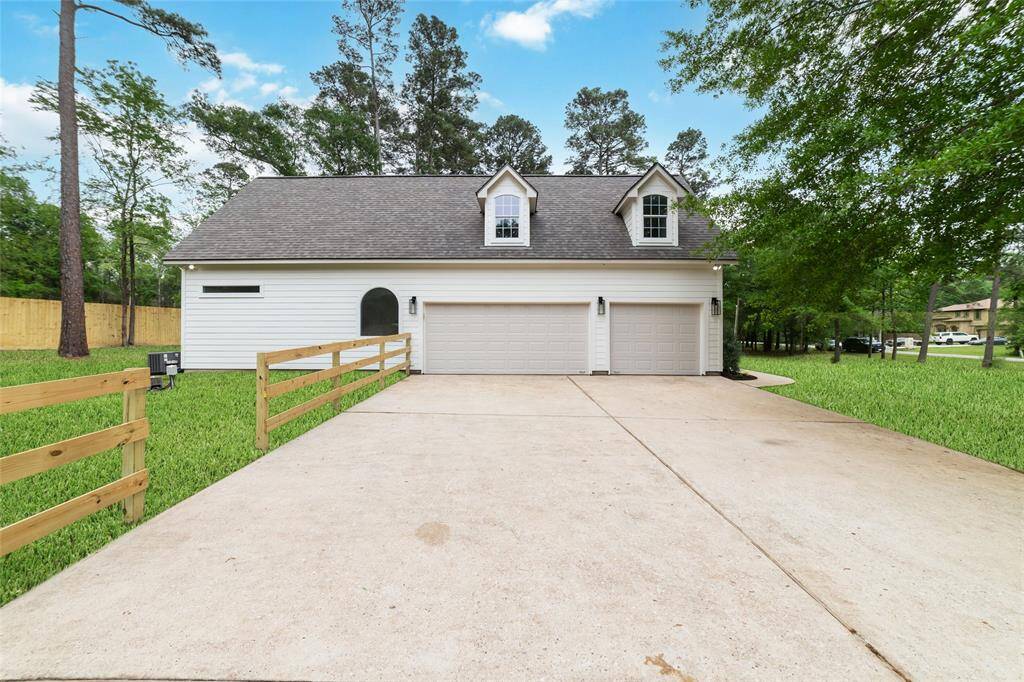 Spacious driveway for ample parking.