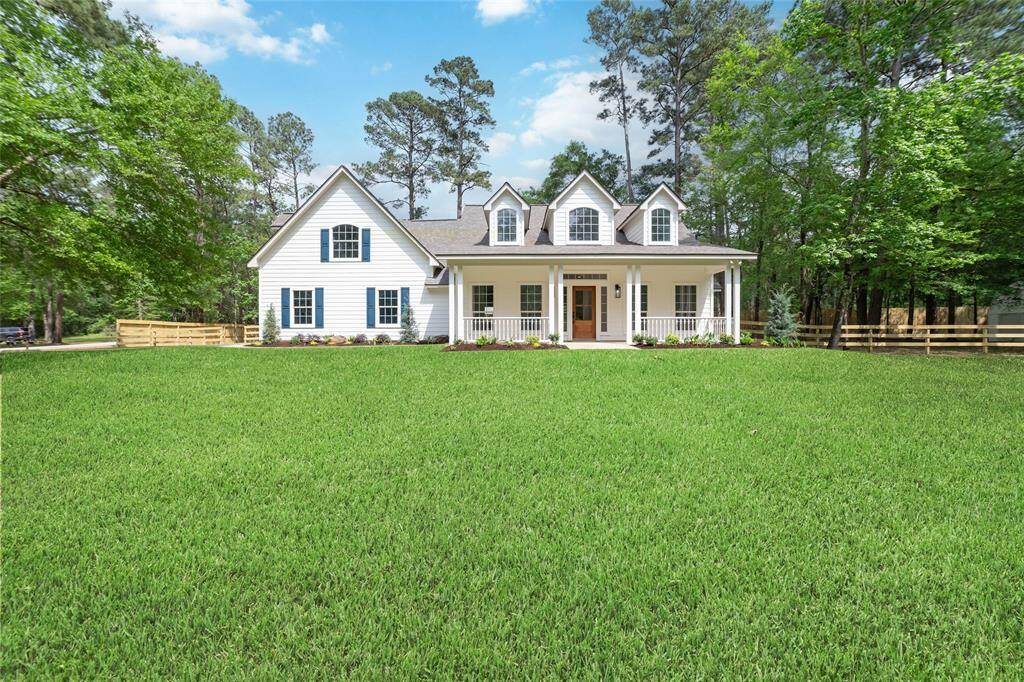 Discover this charming home, perfectly nestled on an expansive lot, offering privacy and serene views.