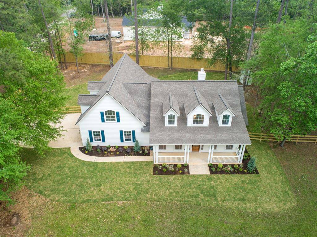 You will love this gorgeous home on a wooded lot.