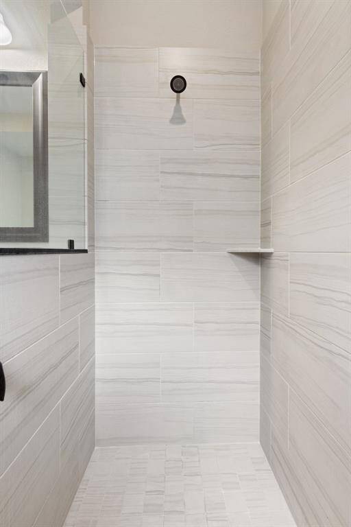 Oversized walk-in shower.