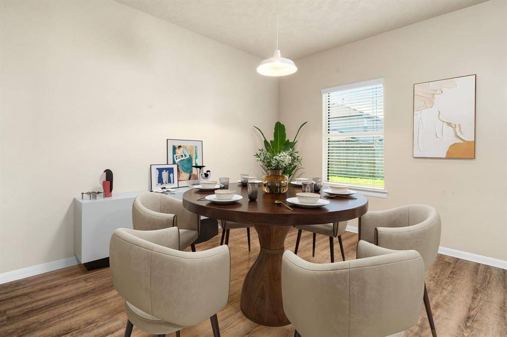 Start your day off right with a cup of coffee sitting with your family in the lovely breakfast area! Featuring large windows with blinds, custom neutral paint, tile flooring, recessed lighting and high ceilings. *Virtually Staged