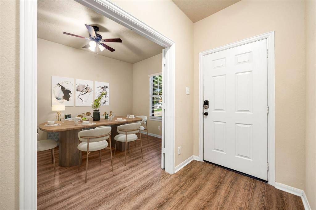 Bright and inviting formal dining room, perfect for elegant dinners and memorable gatherings.