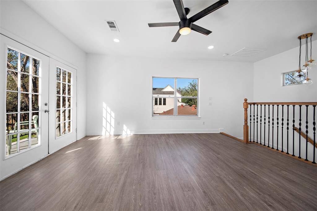 Upstairs game room has access to balcony