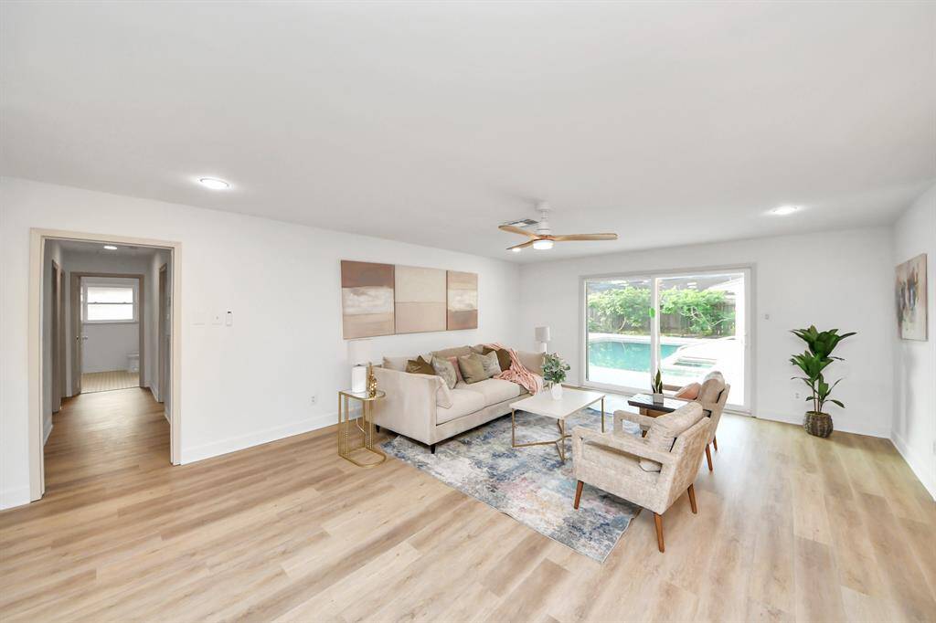 Living room with view of the pool