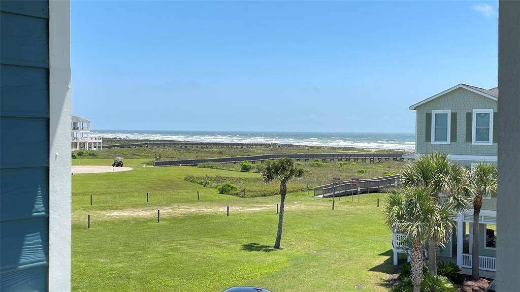 Unobstructed beach views from the second level balcony, accessible from the family room