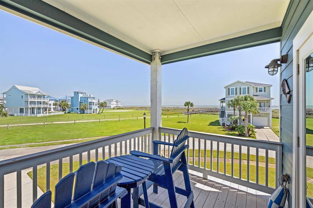 Unobstructed Beach views from Bedroom 2's private balcony on the First Floor