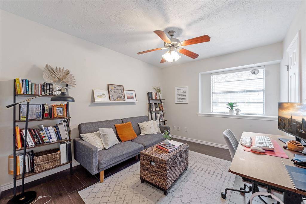 Secondary Bedroom #2  with lighted ceiling fan, and fresh paint
