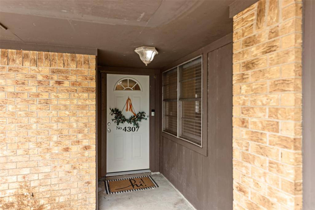 Covered Entry with Window to Breakfast Room