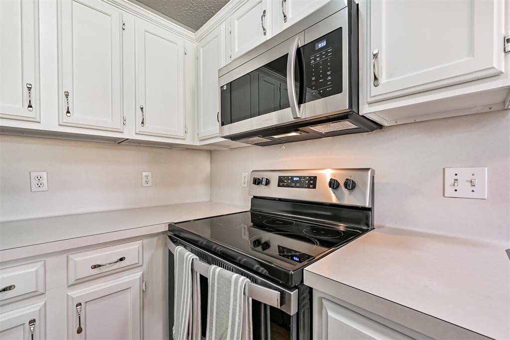 Kitchen including refrigerator