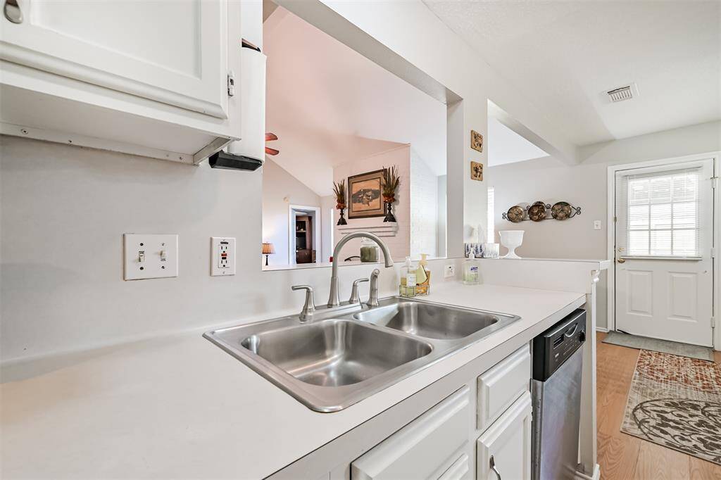Kitchen including refrigerator