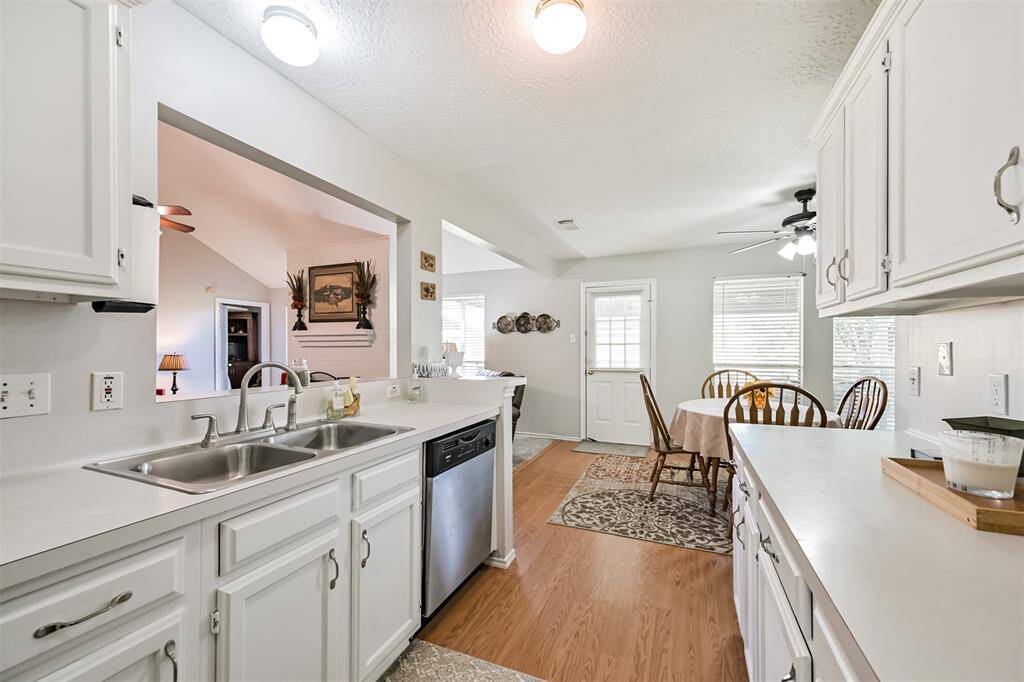 Kitchen including refrigerator