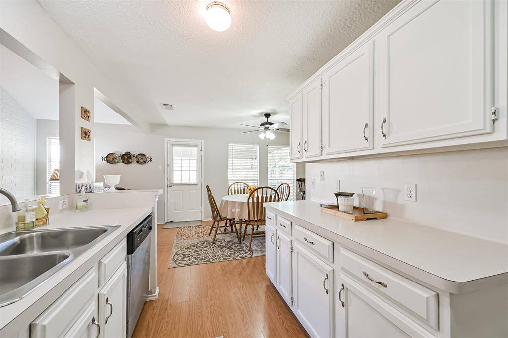 Kitchen including refrigerator