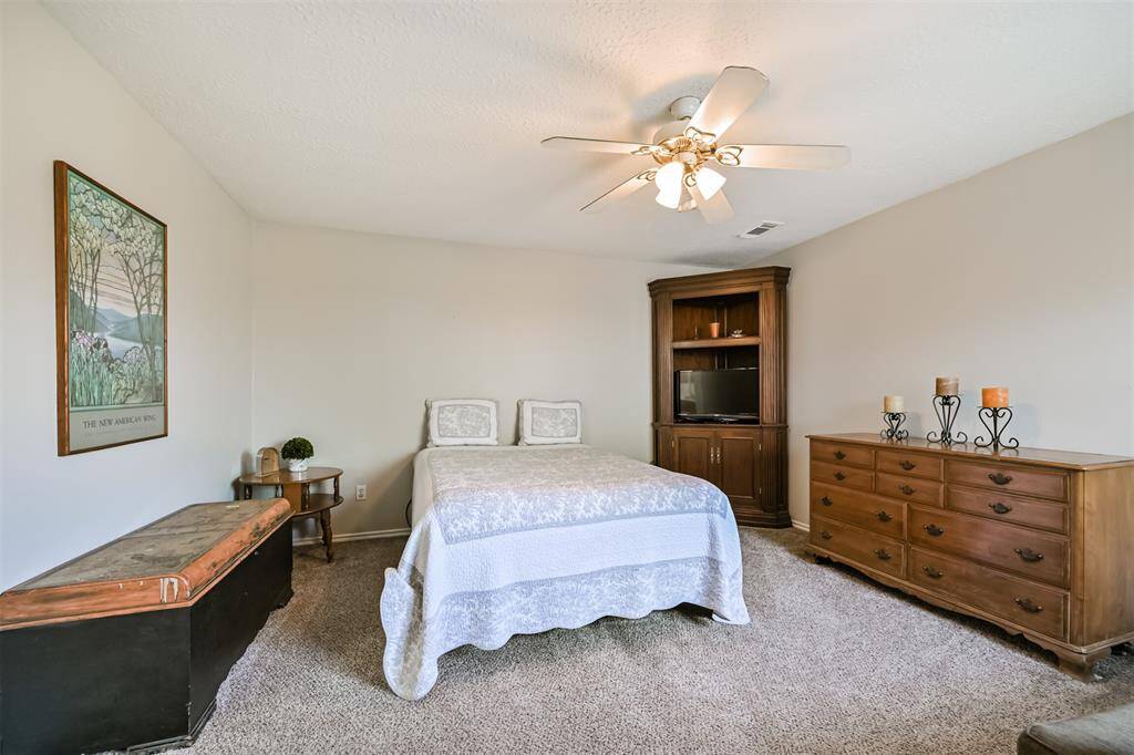 Primary bedroom with ensuite bathroom