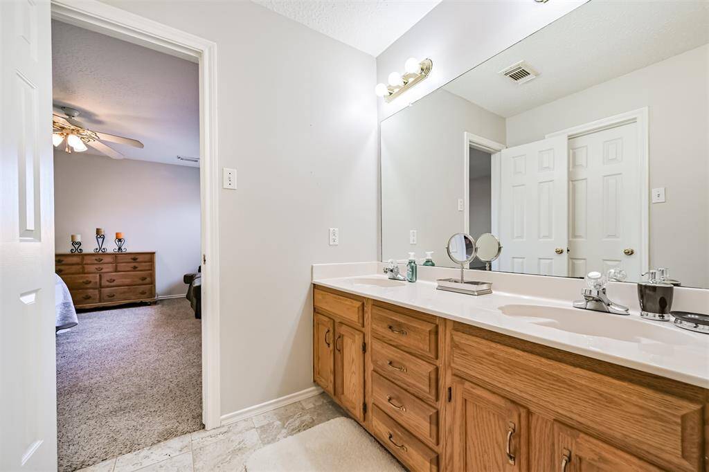 Primary bedroom with ensuite bathroom