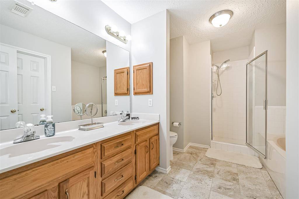 Primary bedroom with ensuite bathroom